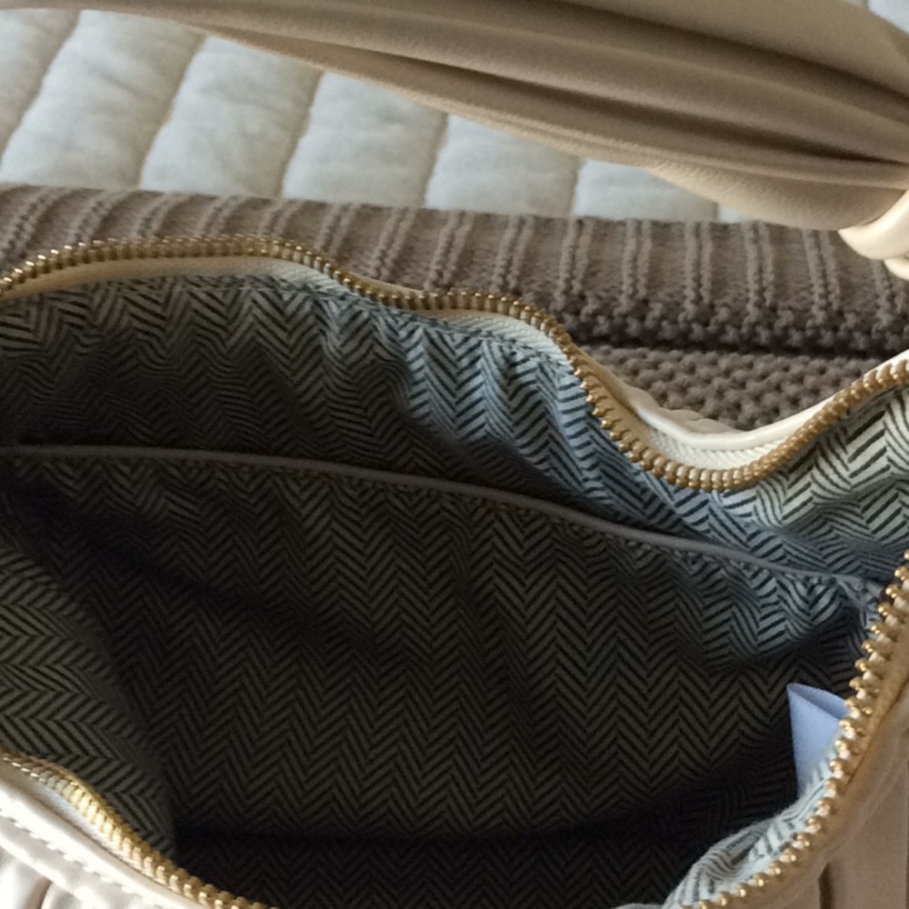 Buttery soft Urban Expression cream handbag. - Picture 3 of 4